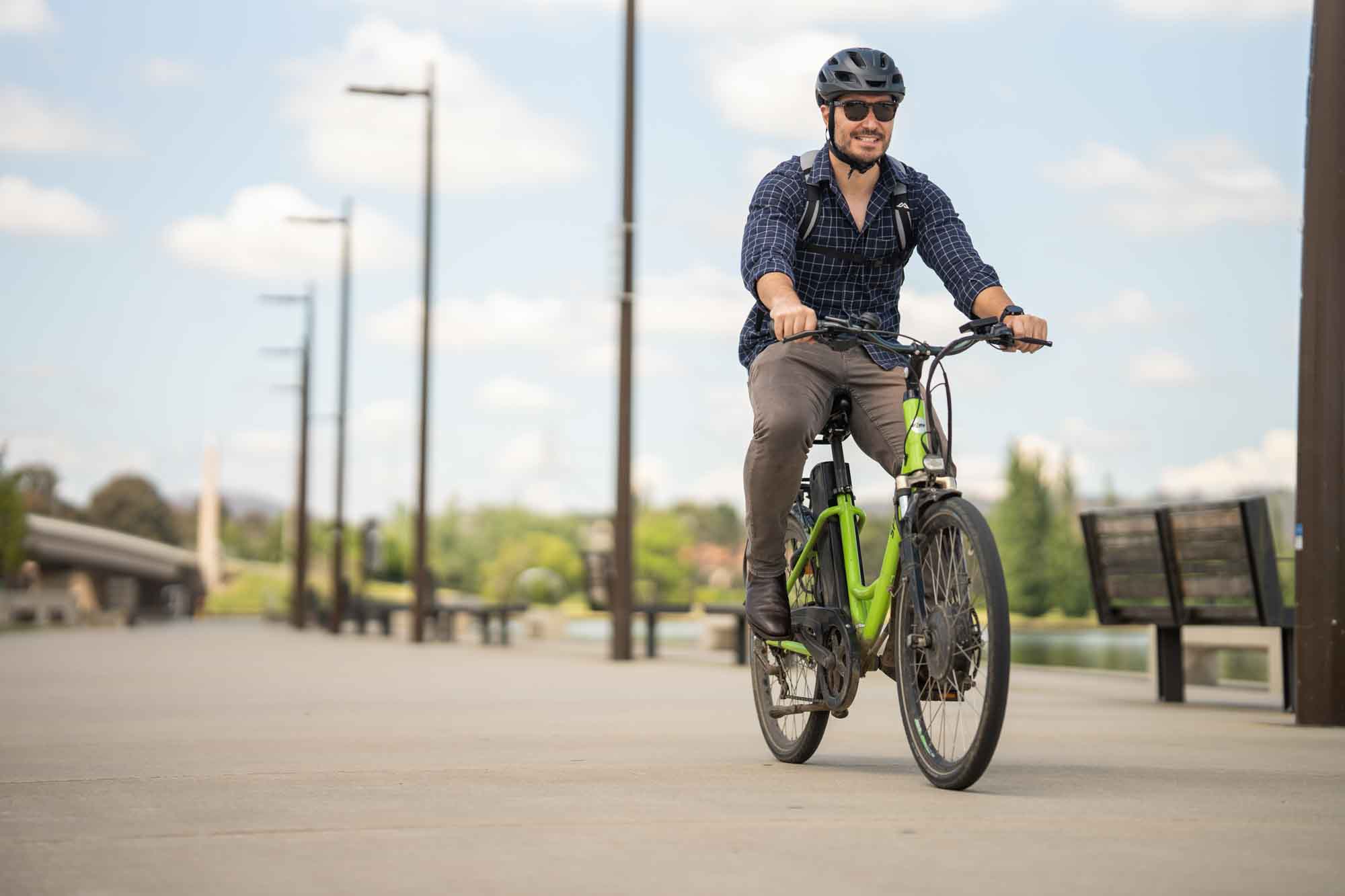 Person cycling on path